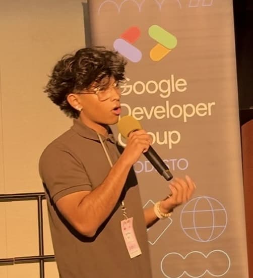 Sarthak Pani speaking at a Google Developer Group event